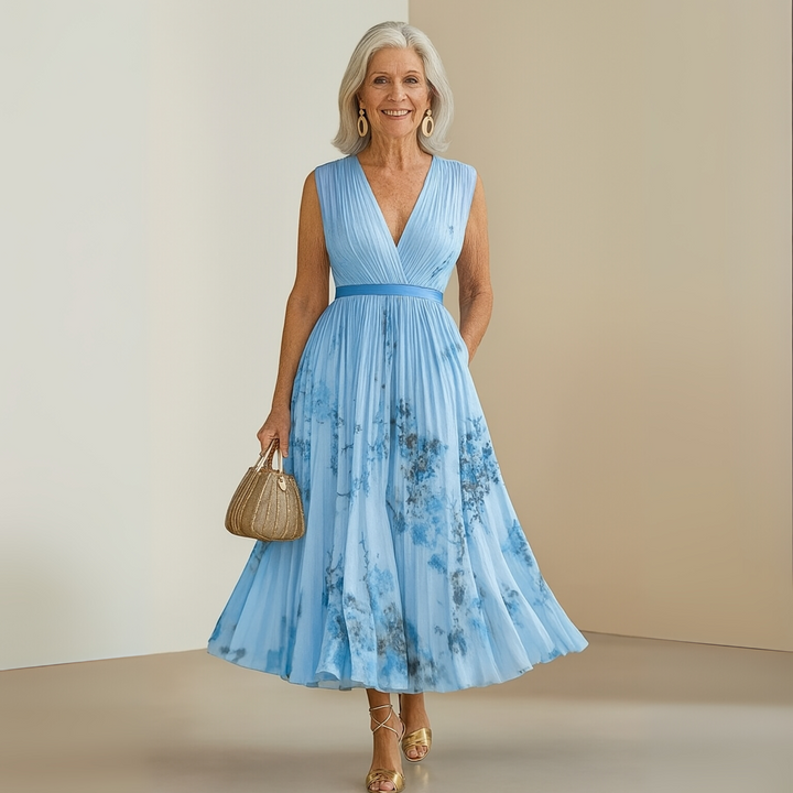 Nora | Maxi Wedding Guest Dress with Floral Print and Pleated Skirt
